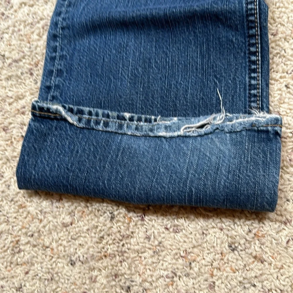 Good used condition American eagle factory distressed bootcut jeans. - Picture 11 of 11